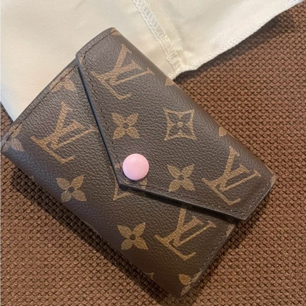 Louis Vuitton Monogram Wallet with Pink Button